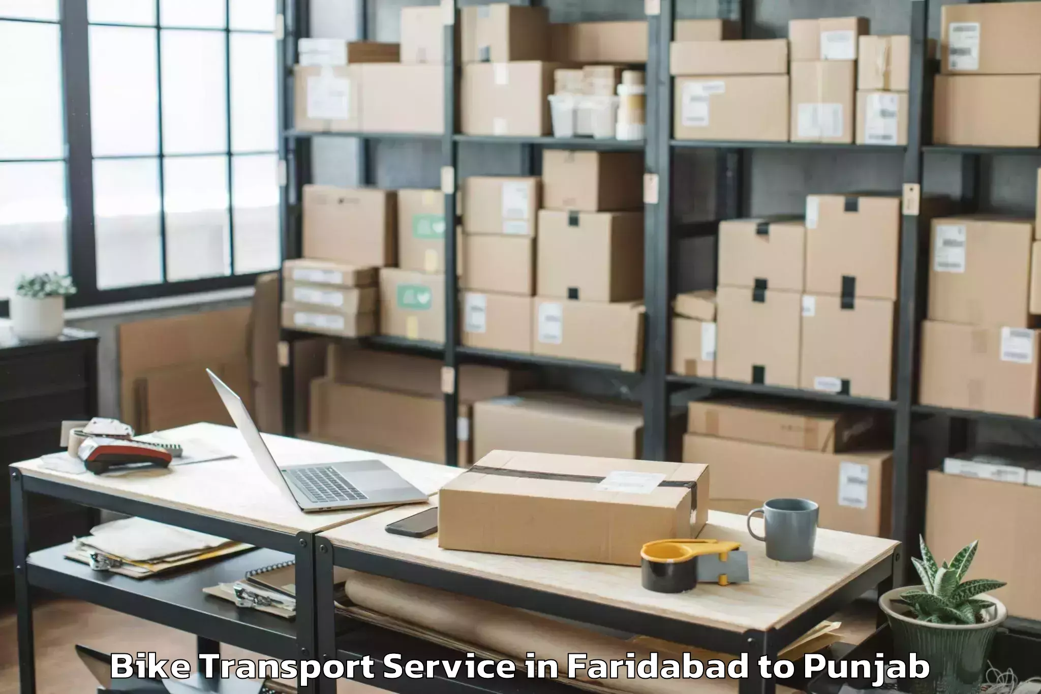 Professional Faridabad to Tapa Bike Transport